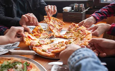 People eating pizza