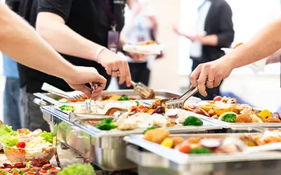 People eating catered food