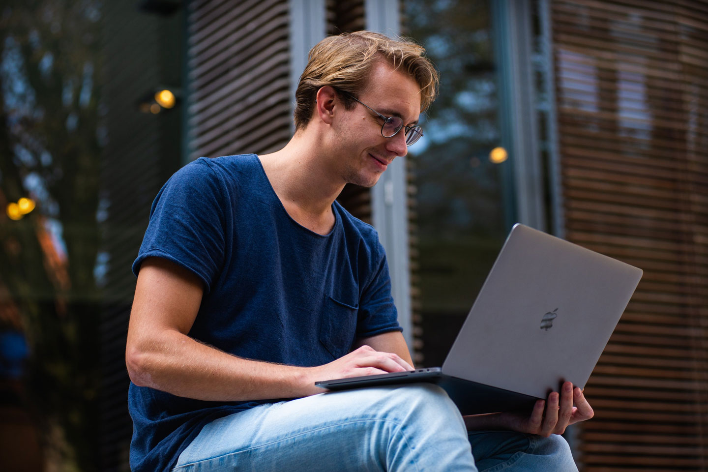 Photo of a man with a laptop