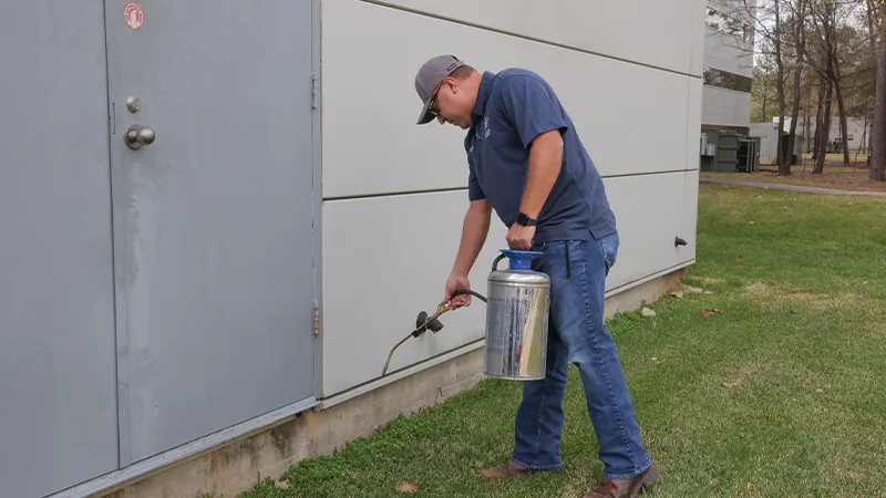 Man spraying pesticide
