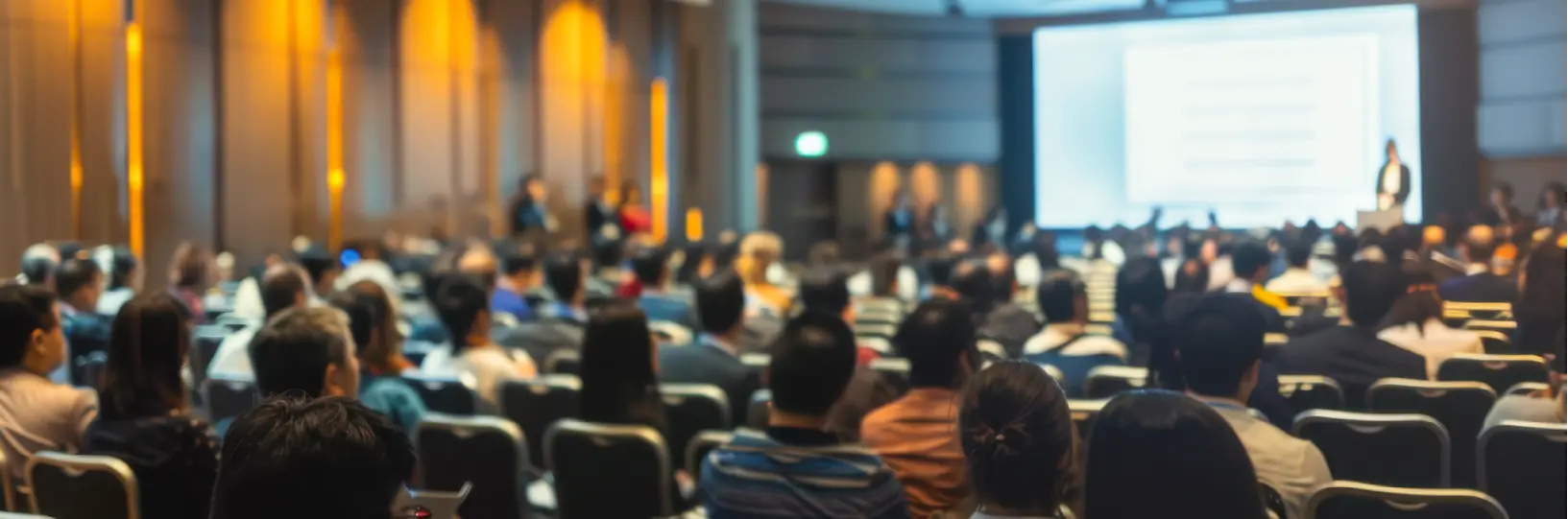 Audience listening to a speaker
