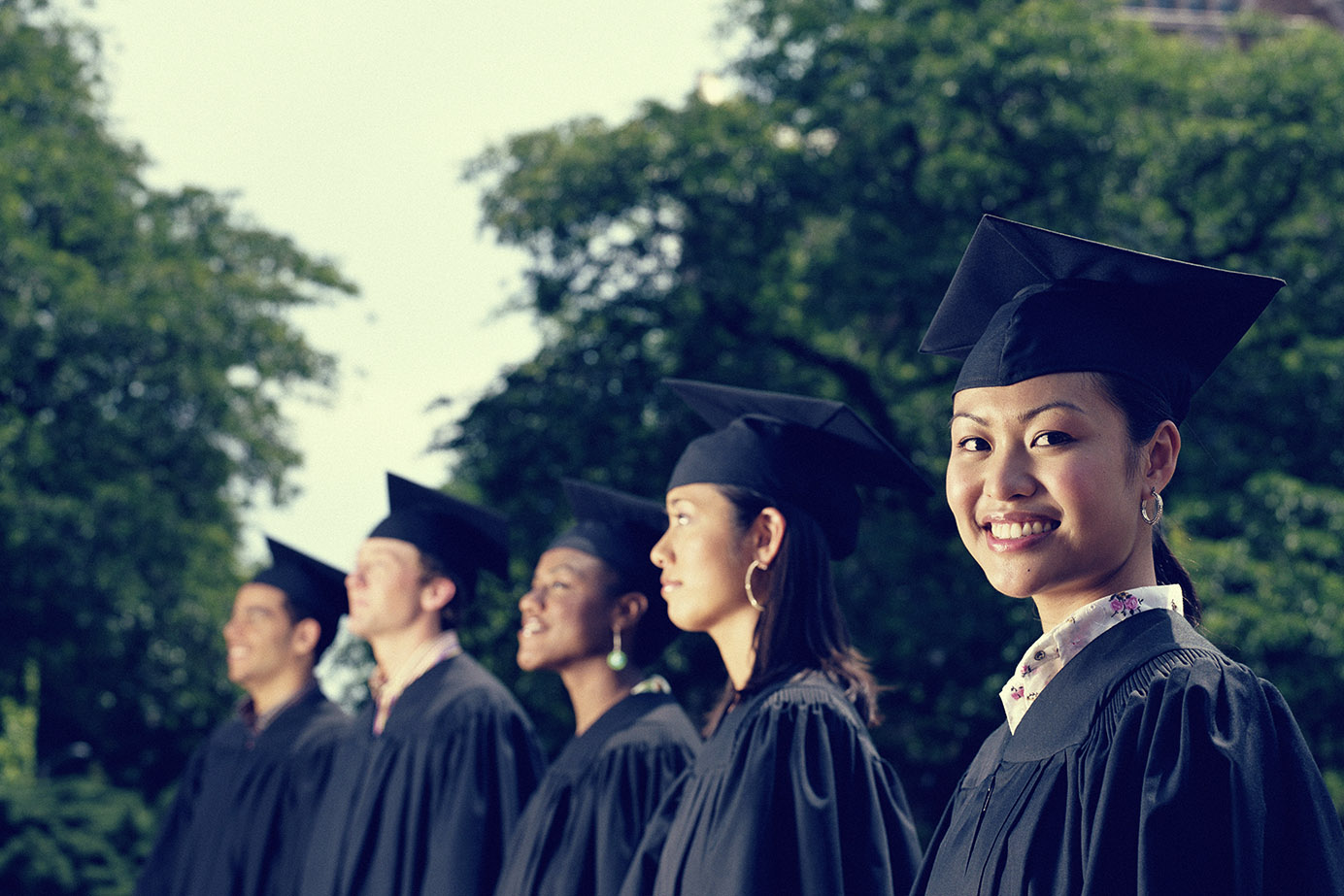 Graduating students standing in a row