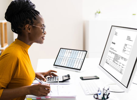 Woman Sitting at Computer