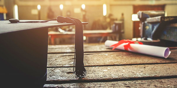 Photo of Graduation Cap on Table