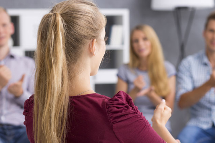 Instructor teaching a group of adults