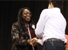 Photo of Two people shaking hands