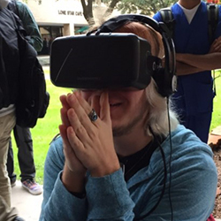 Student wearing virtual reality googles