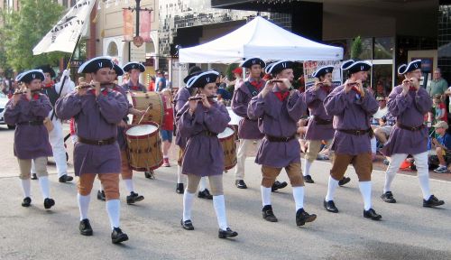 Lord Stirlings Fifes & Drums marching in a line 