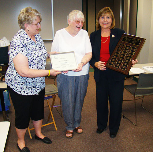 Nancy Price (center), was recently named the 2010 Instructor of the Year by Lone Star College-Montgomery’s Academy for Lifelong Learning. Judi Bonds (on left), ALL advisory council chairman, and Donna Smith Burns (on right), ALL program coordinator, present Price with her certificate and plaque.
