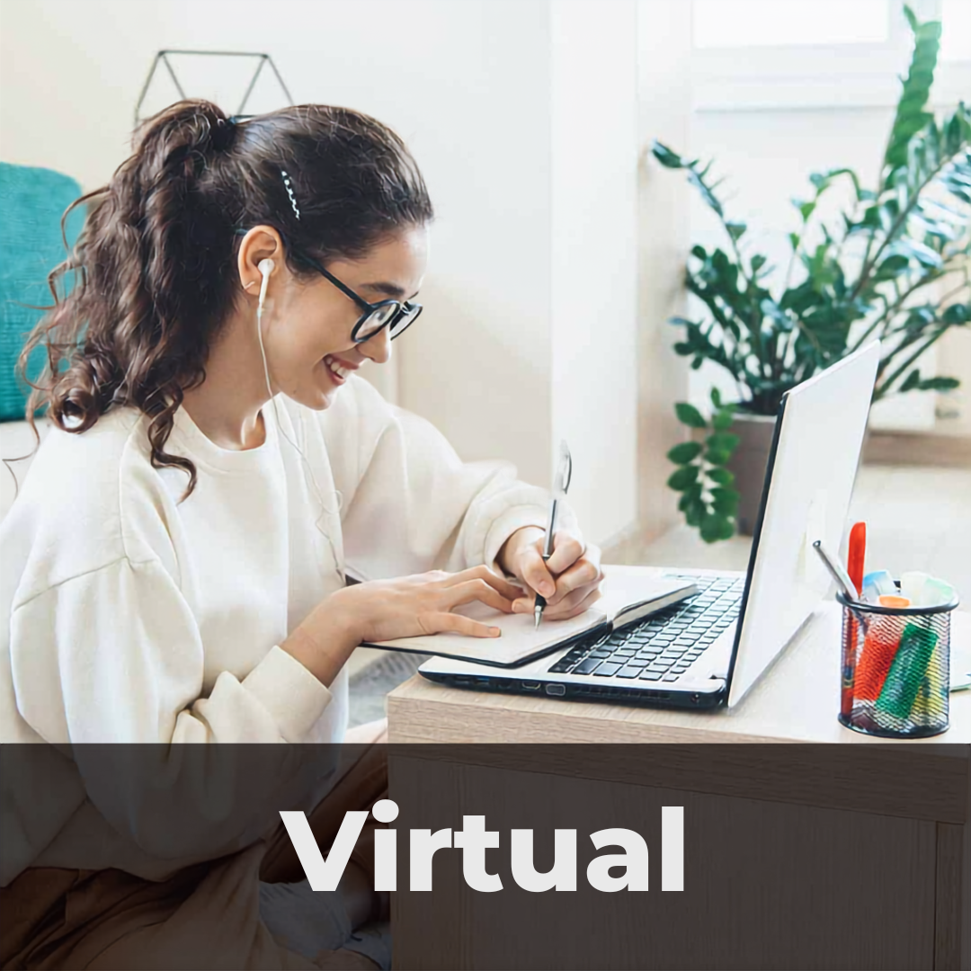The word Virtual is written across the bottom of the image as a header. Photo of a girl smiling, sitting on the floor of her living room in front of a laptop.