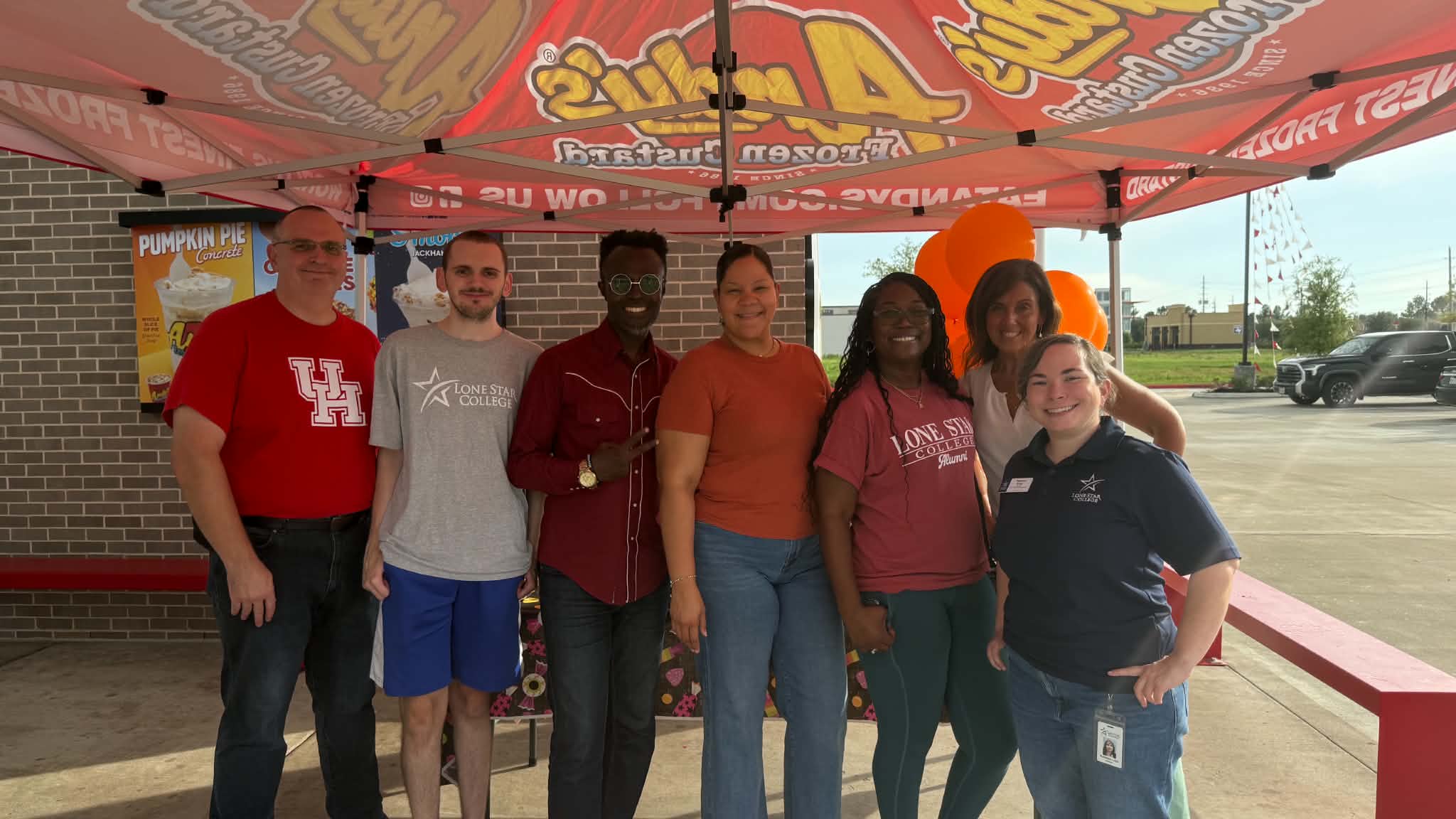 Group of alumni at an ice cream event for alumni