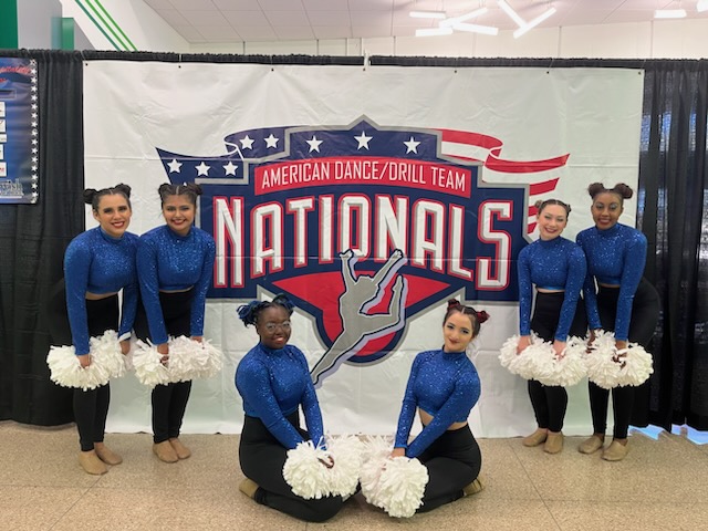 Group Photo of LSC-CyFair Dance Team with Blue Jeans and Cowboy boots and Pom-poms