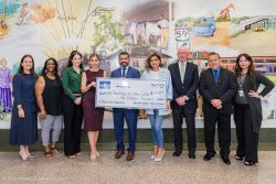 Photo of EAMD officials presenting check to LSC-Kingwood and LSC-East Aldine leadership