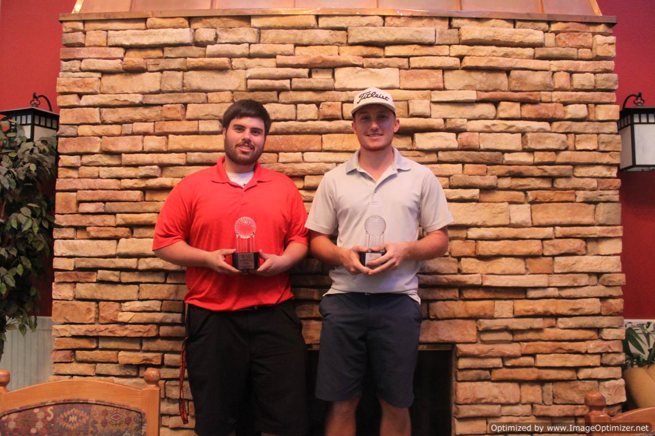 Photo of students holding a trophy