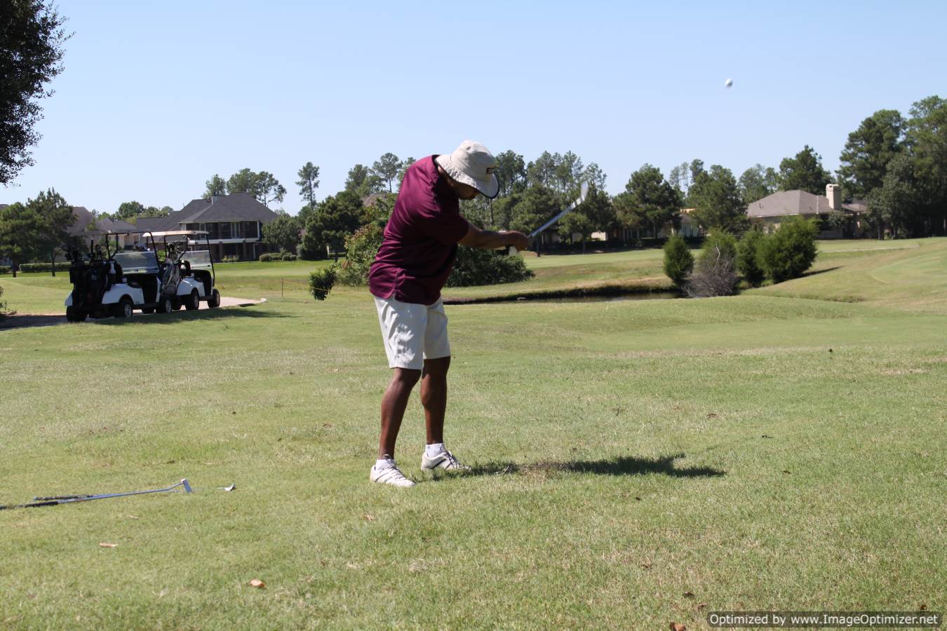 Photo of LSC employee playing golf