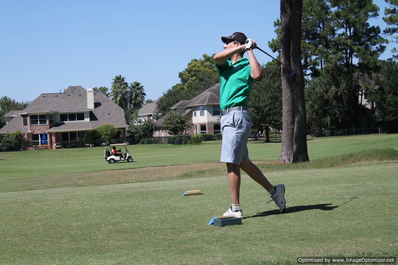 Photo of student playing golf