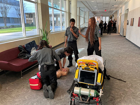 Students concentrate on refining their EMS techniques, gearing up for a skills challenge at the TXPSTA High School First Responders State Competition at Lone Star College-University Park, Feb. 24, 2024.
