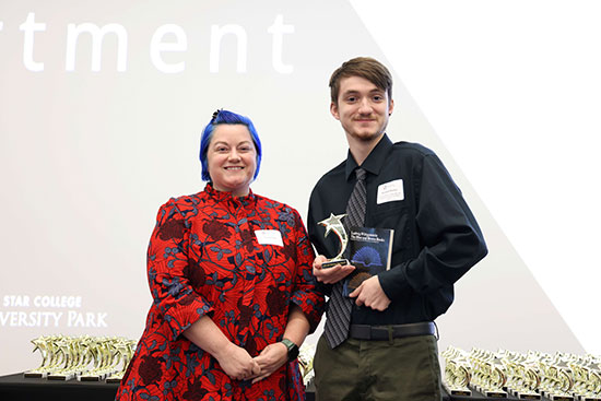 Lone Star College-University Park Philosophy Professor Vanessa Voss (left) celebrates with Marshall Mullins (right) at the 8th Annual Shining Stars Awards. 