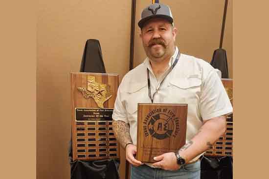 Jason Corthell receives instructor of the year award