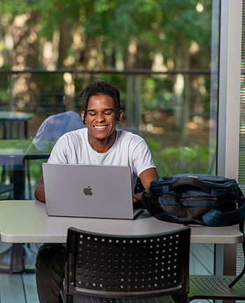 Student with laptop