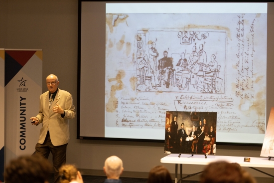 Larry Cook presenting Francis B. Carpenter's handwritten diaries