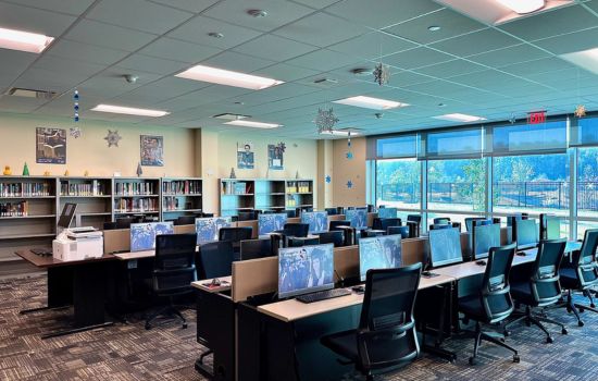 Room with computers and books