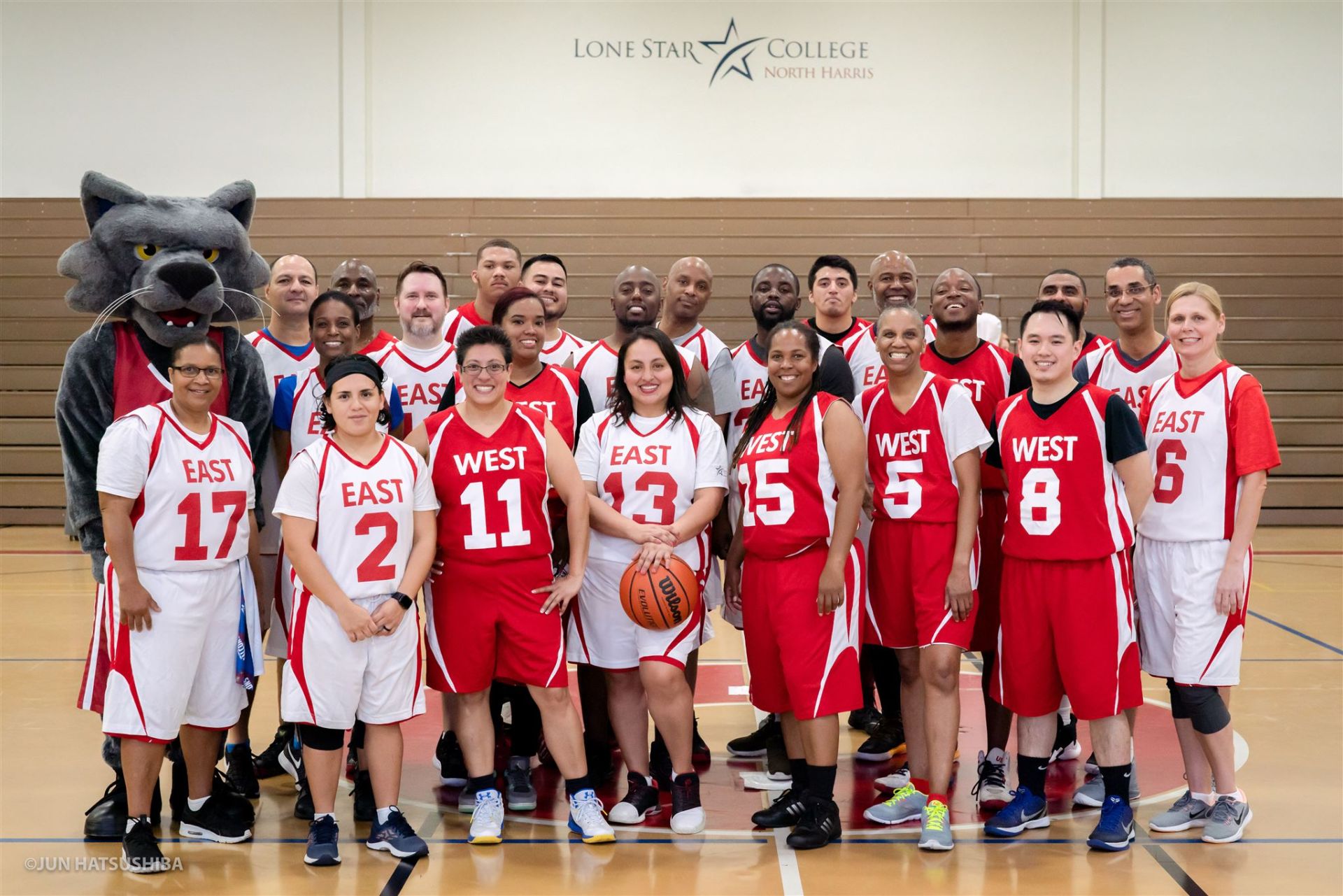 Photo of basketball staff teams posing for photo