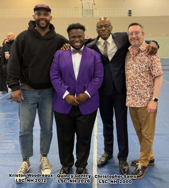 LSC-North Harris students, Kriston Woodreaux, Quincy Gentry, and Christopher Sams pose with their coach, Professor Wade Hescht.