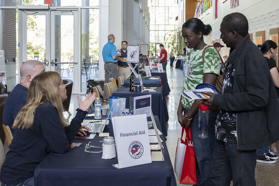 Photo of students at open house event