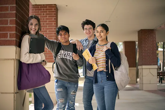 Group of Montgomery students standing in hall