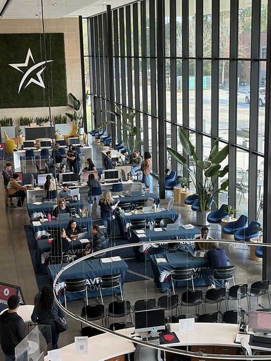 View of Maverick Student Center with students meeting advisors for registration 