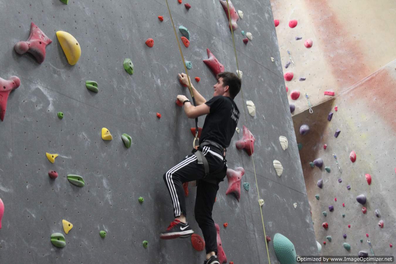 Photo of student climbing wall 