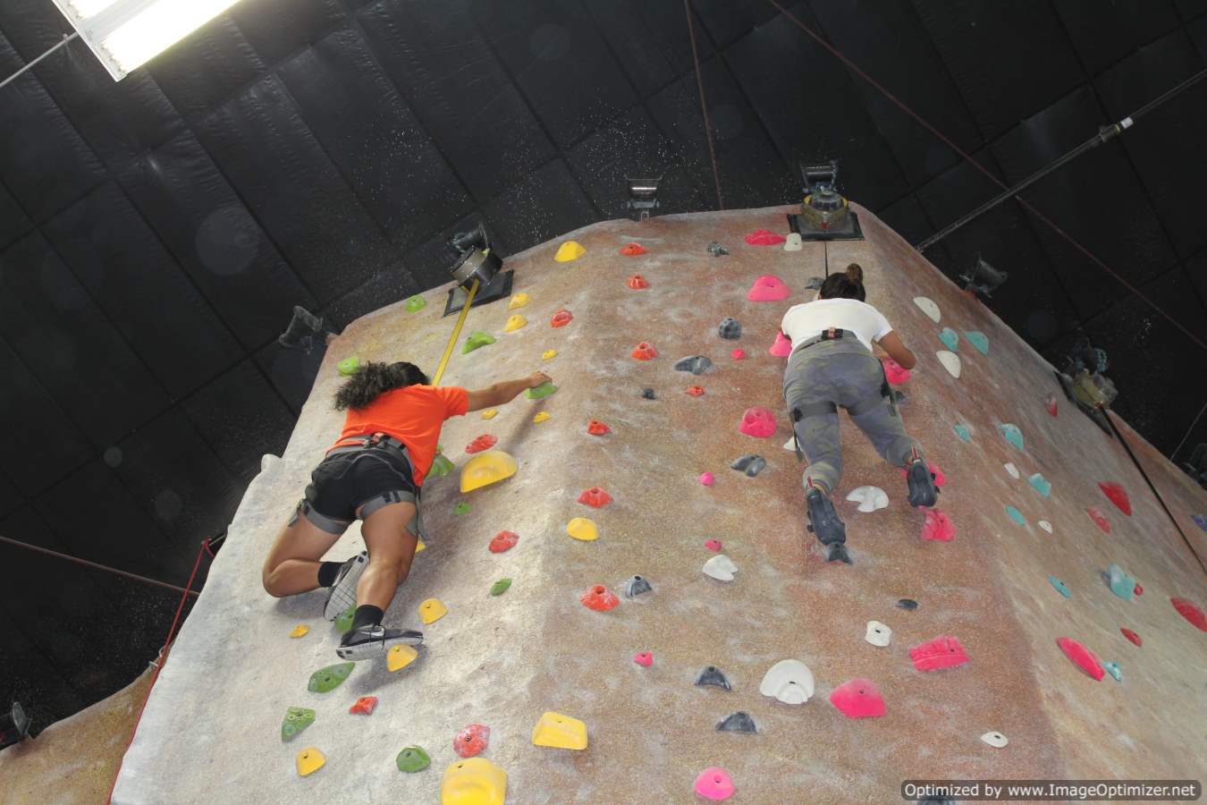 Photo of students climbing a wall