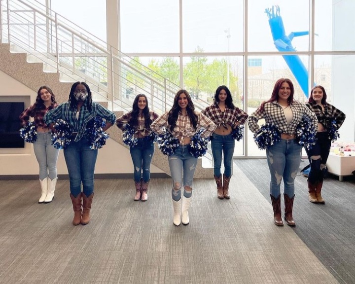 Group Photo of LSC-CyFair Dance Team with Blue Jeans and Cowboy boots and Pom-poms
