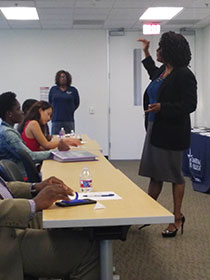 Photo of a woman teaching class