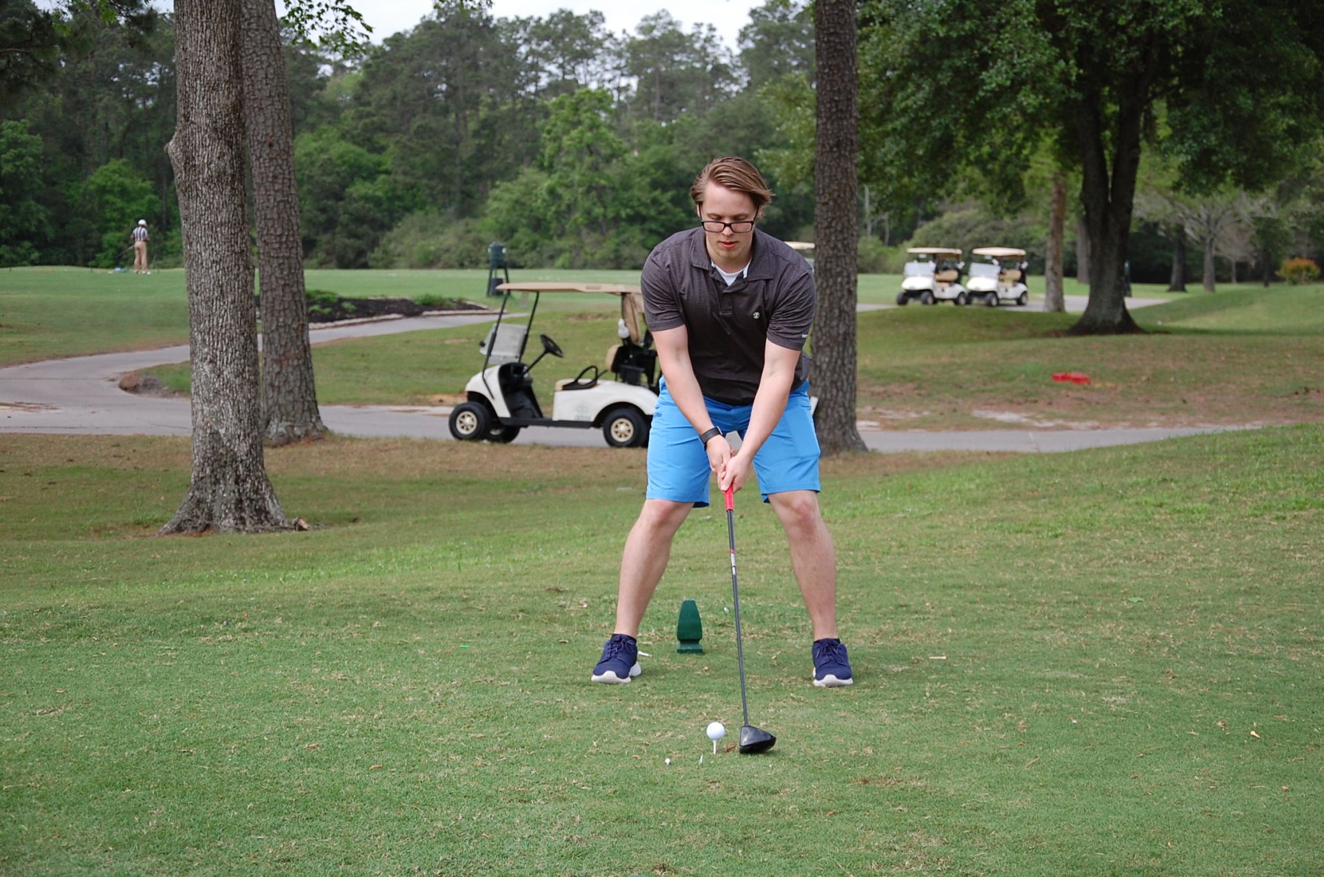 Photo of student playing golf