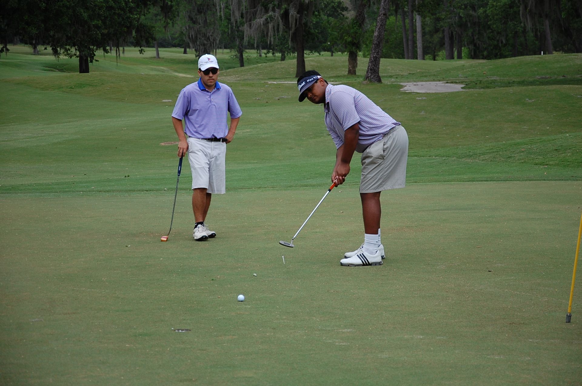 Photo of students playing golf