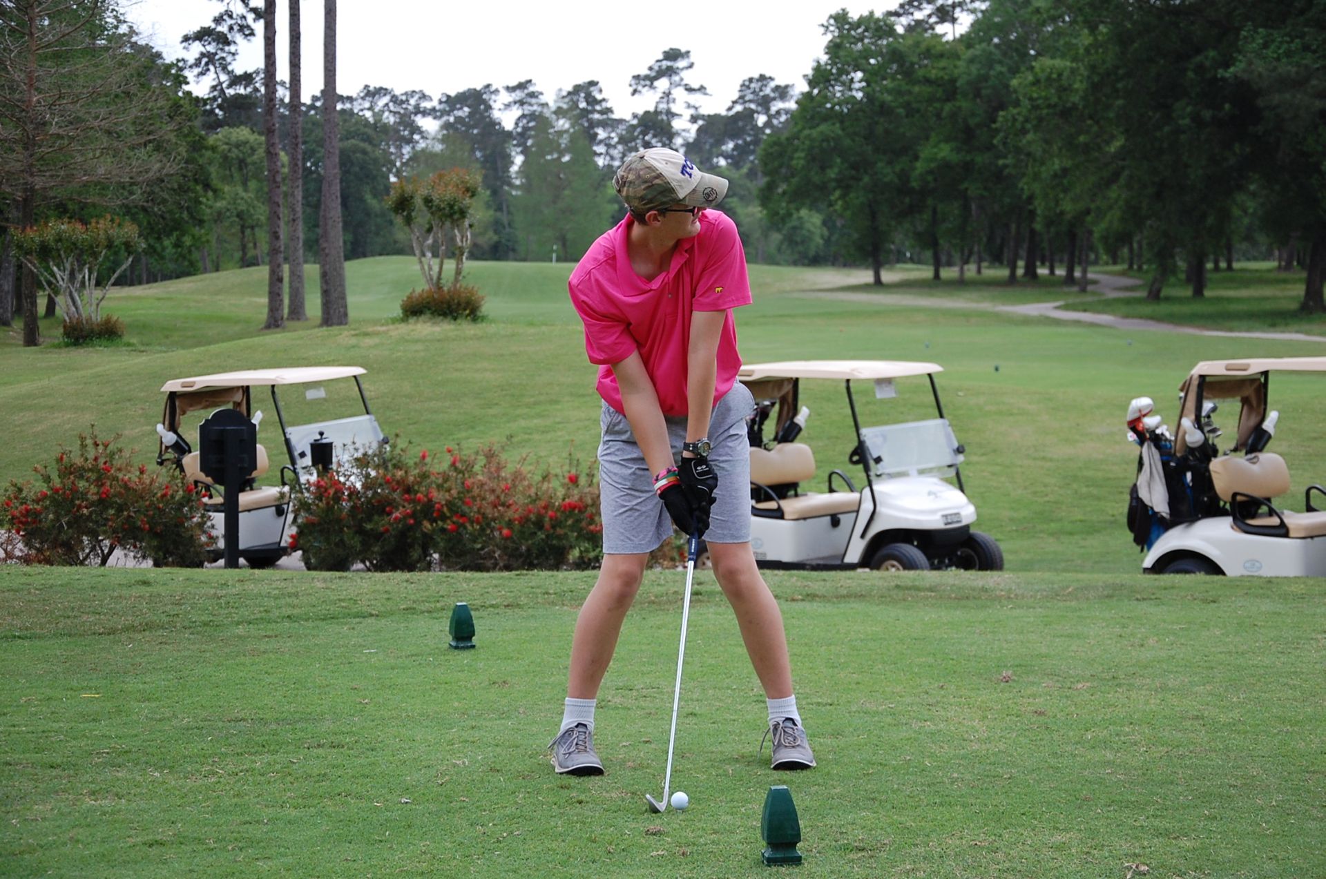 Photo of student playing golf