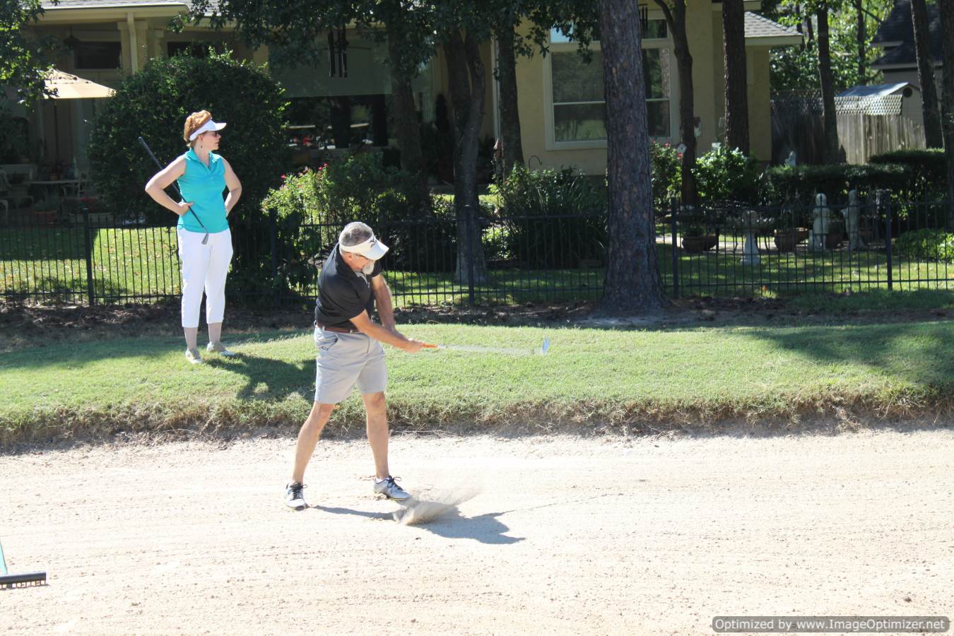 Photo of LSC employees playing golf