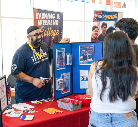 staff helping students