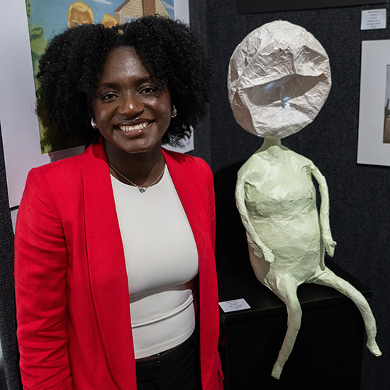 Pharmacy Tech Talaura Stoker's papier-mache alien "Glip Glop" took first in 3d Design.
