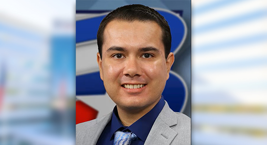 Tyler Hoskins, a multimedia journalist at KBTX-TV and an alum of Lone Star College-University Park, is pictured in the newsroom. 