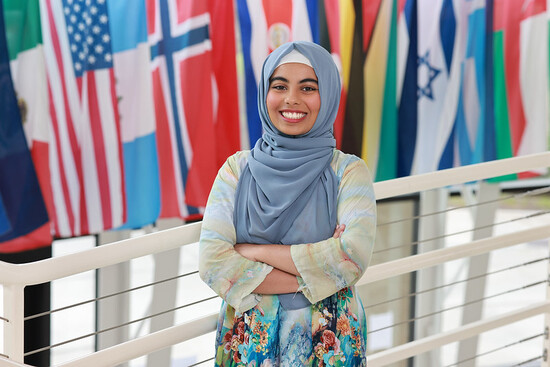 Student Warda Binte Zahid posing in the Library