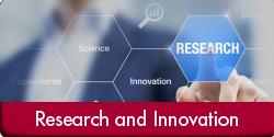 Research and Innovation (Photo of a person in a suit reaching out to point to and highlight a hexagon overlayed in the foreground. The highlighted hexagon reads "RESEARCH" while adjacent hexagons read "Experiments" -- "Science" -- "Innovation" -- "Research and Innovation" appears in a red bar along the bottom of the image.)