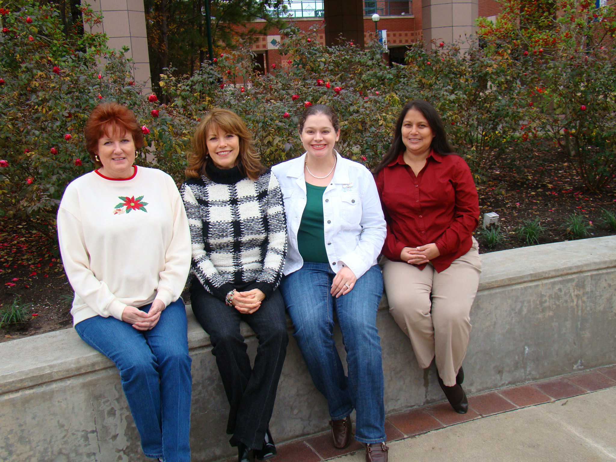 The recipients of Lone Star College-Montgomery’s 2009 Staff Excellence Awards are (l. to r.): Jane Thorn, custodian supervisor; Joan McLouth, division coordinator; Liz Centanni, division coordinator; and Manuela Sandoval, nursing lab coordinator.