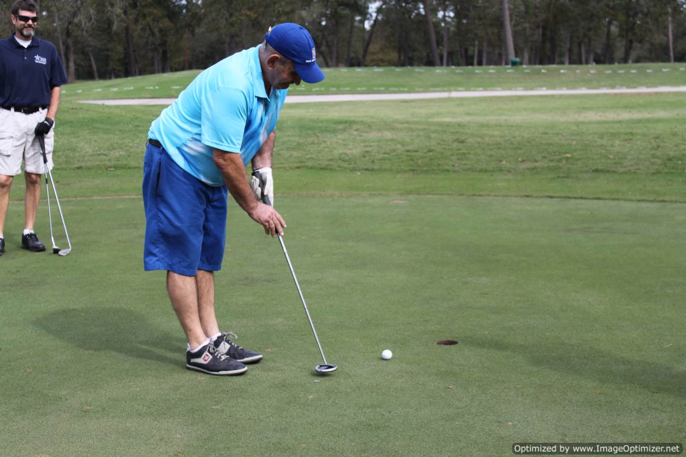 Photo of LSC employees playing golf