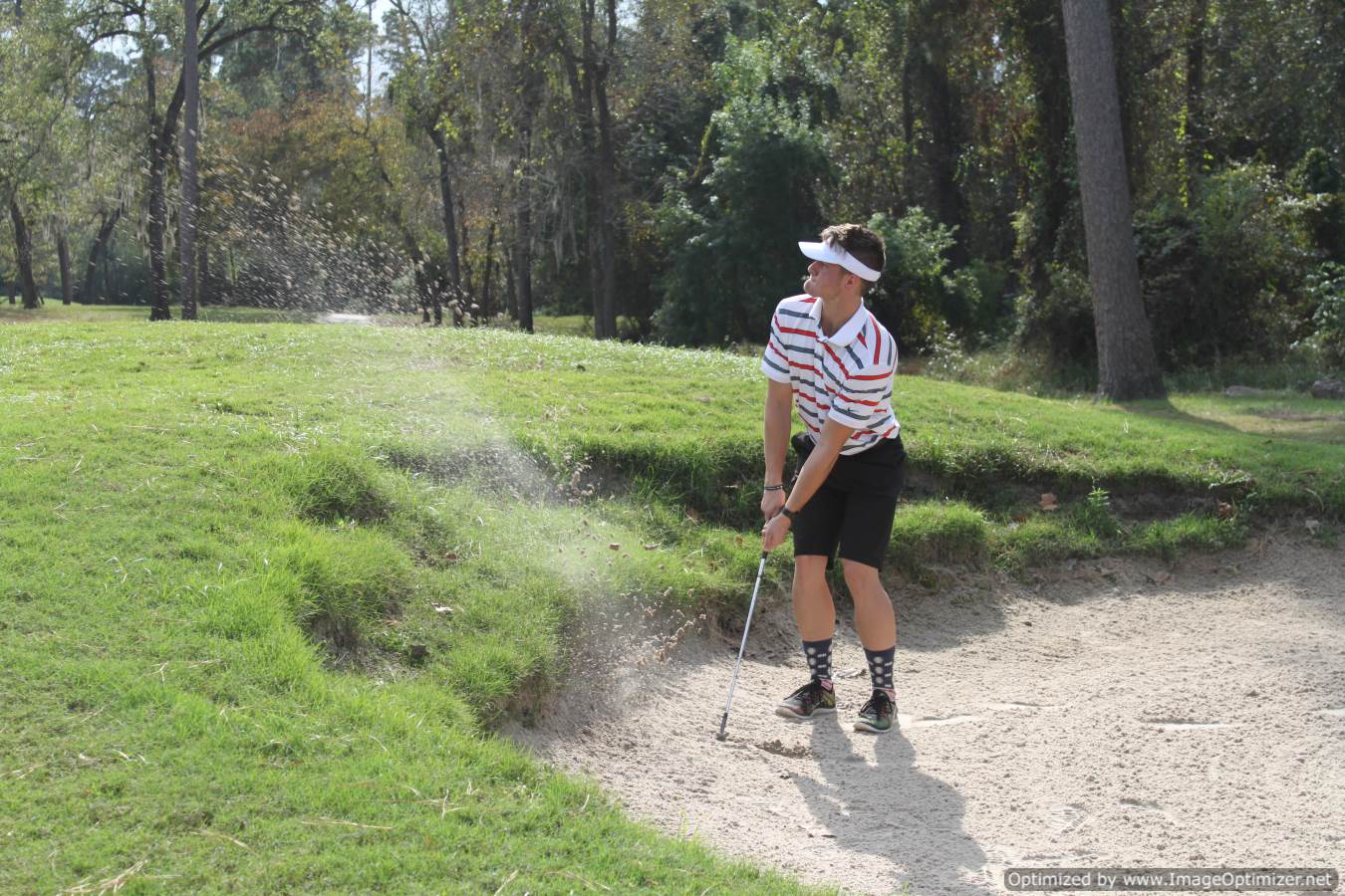 Photo of student playing golf