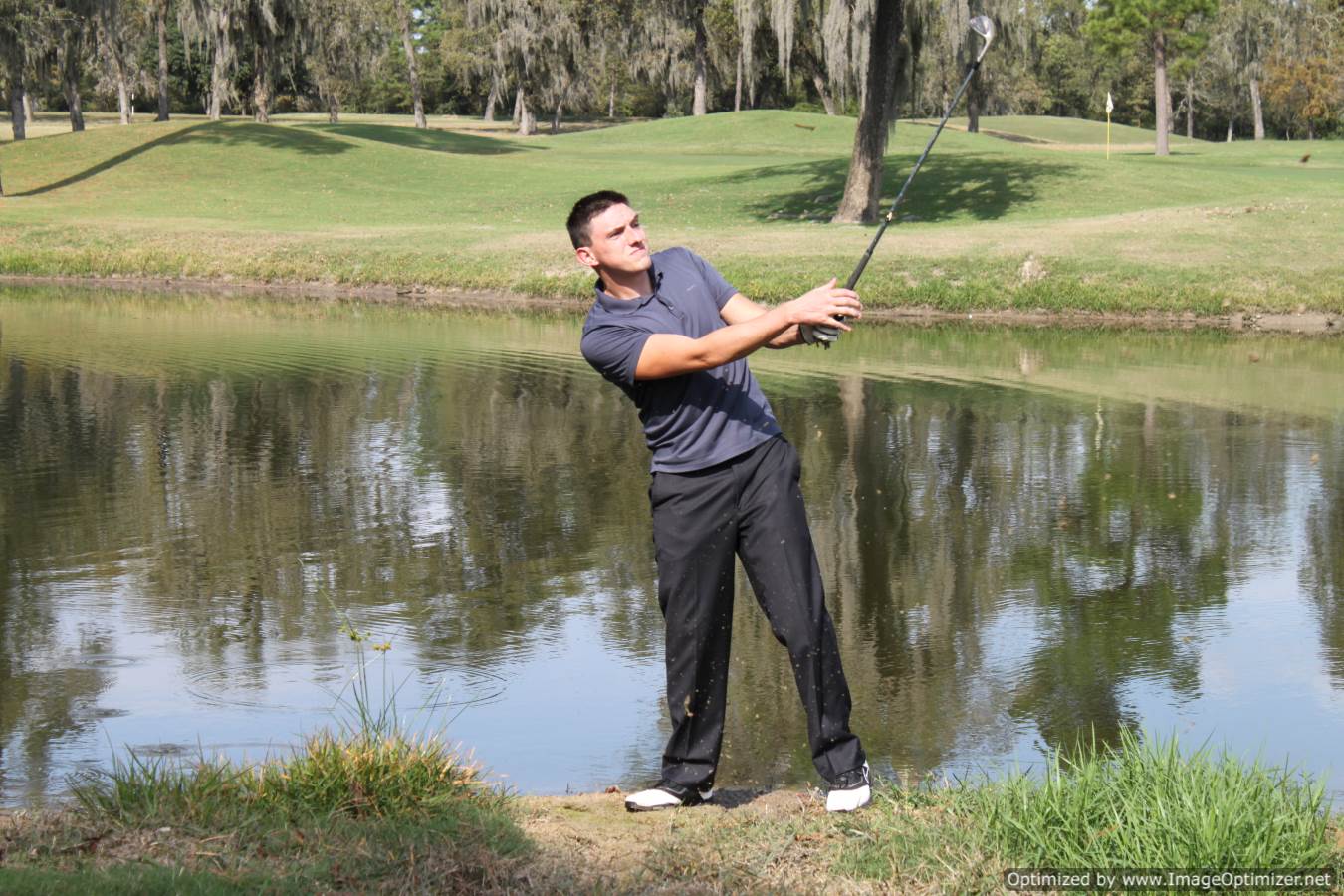 Photo of student playing golf