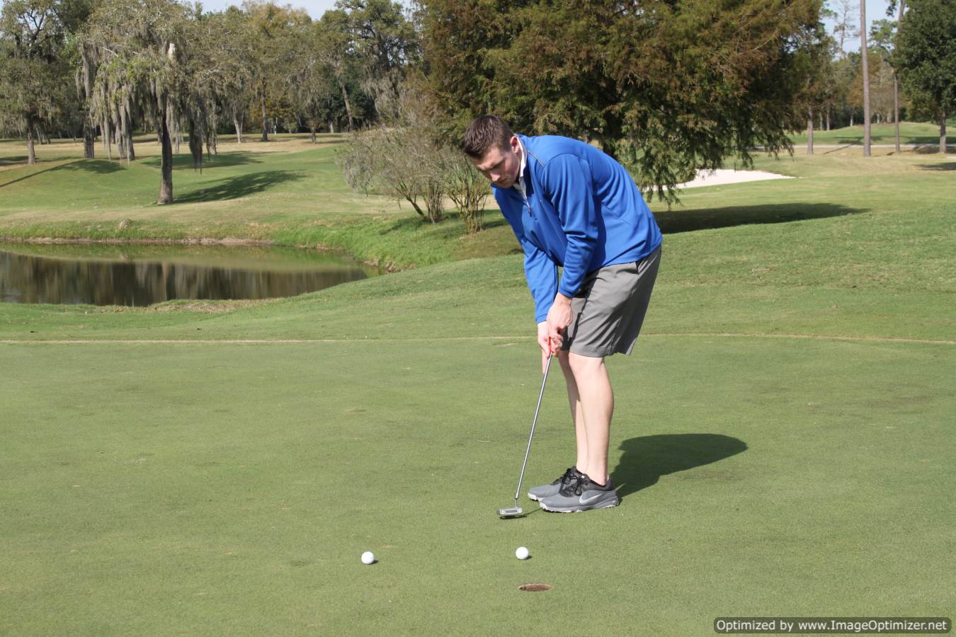 Photo of student playing golf