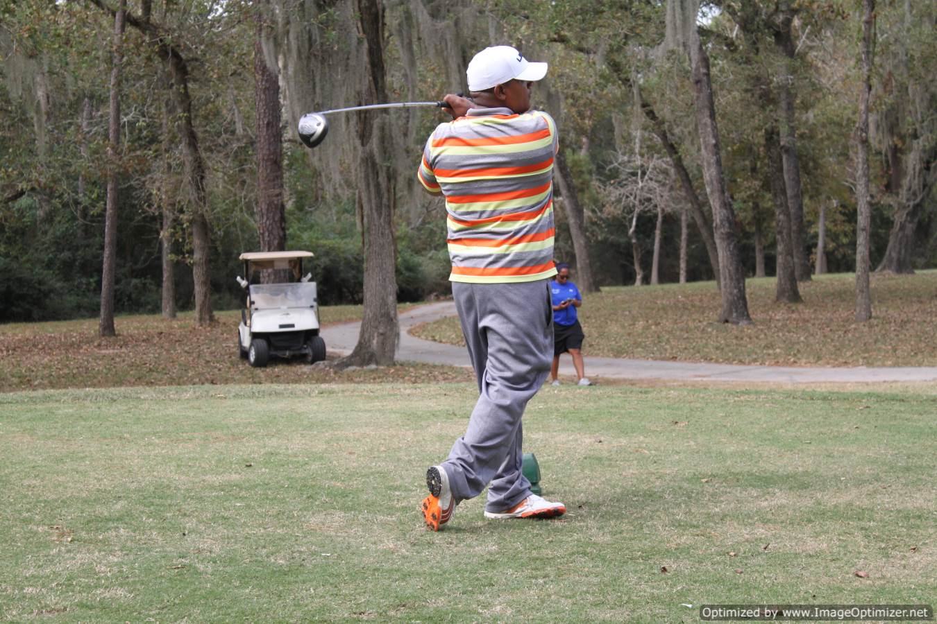 Photo of student playing golf